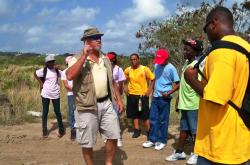John Farchette tells students about the watershed in Southgate Coastal Reserve. John Farchette tells students about the watershed in Southgate Coastal Reserve.